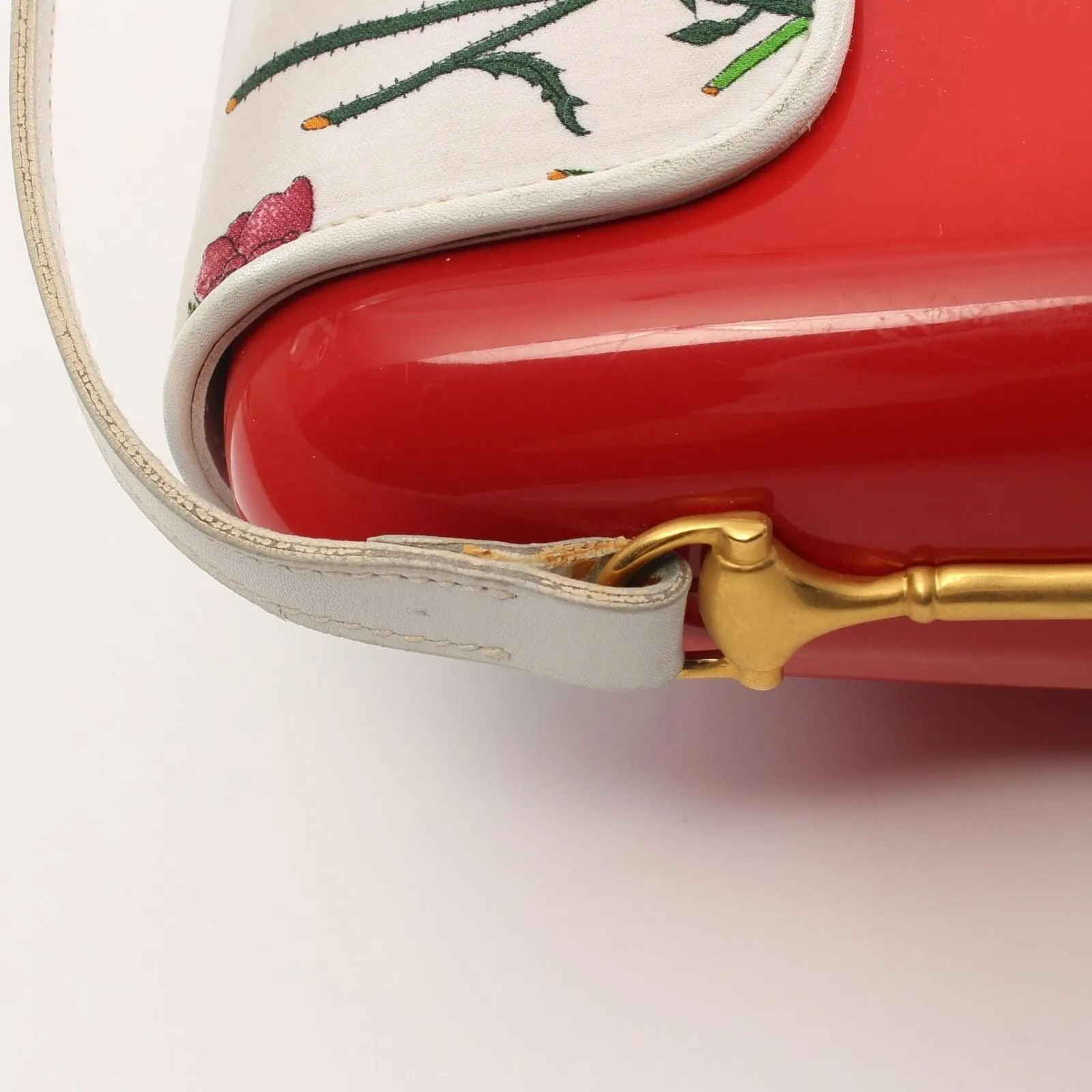 One of a kind, Gucci red Lucite cross body/shoulder bag with a leather floral flap top and gold horse-bit accents!